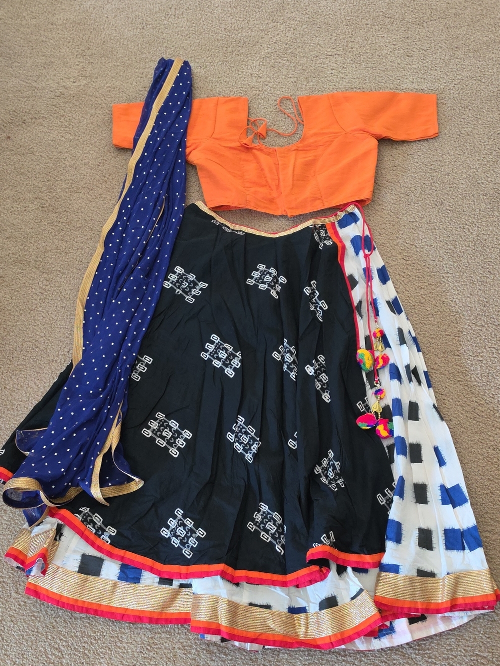 Orange Blouse with Black Printed Skirt and Blue Dupatta Set
